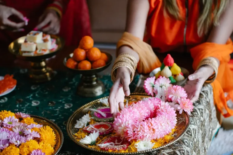 Traditional Clothing Decorating the Table with Flowers